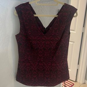 Great top to wear with a black skirt or even jeans
